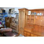 A pine open fronted bookcase fitted single drawer