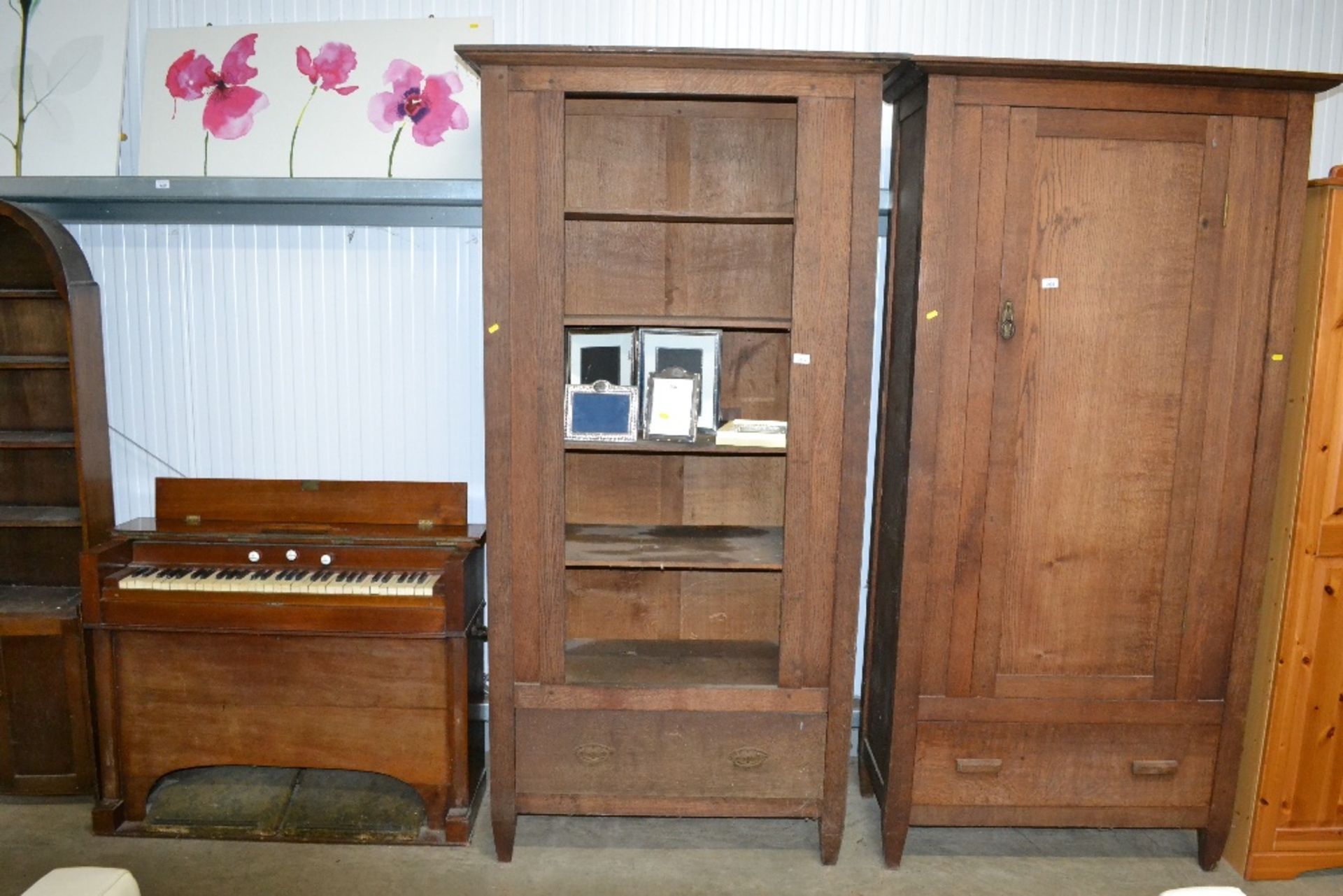 An oak wardrobe lacking door fitted single drawer