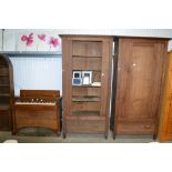 An oak wardrobe lacking door fitted single drawer