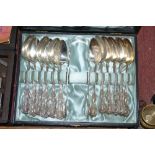 Twelve silver tea spoons and a pair of silver plat