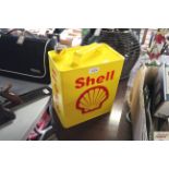 A yellow Shell petrol can (192)