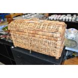 A wicker dome topped basket