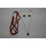 A three strand natural amber necklace with Sterlin