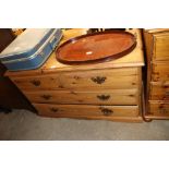 A pine chest fitted two short over two long drawer