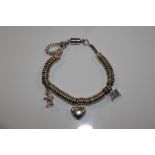 A Links Of London magnetic clasp charm bracelet