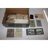 A box of mixed military ephemera to include cloth