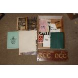 A small box containing various military related it