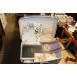A suitcase of various photographs and ephemera