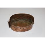 An antique copper pot