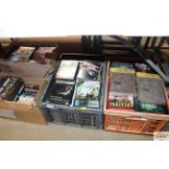 Four boxes of various DVDs