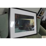 A framed coloured print after Edward Hopper