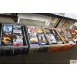 Four boxes of various DVDs
