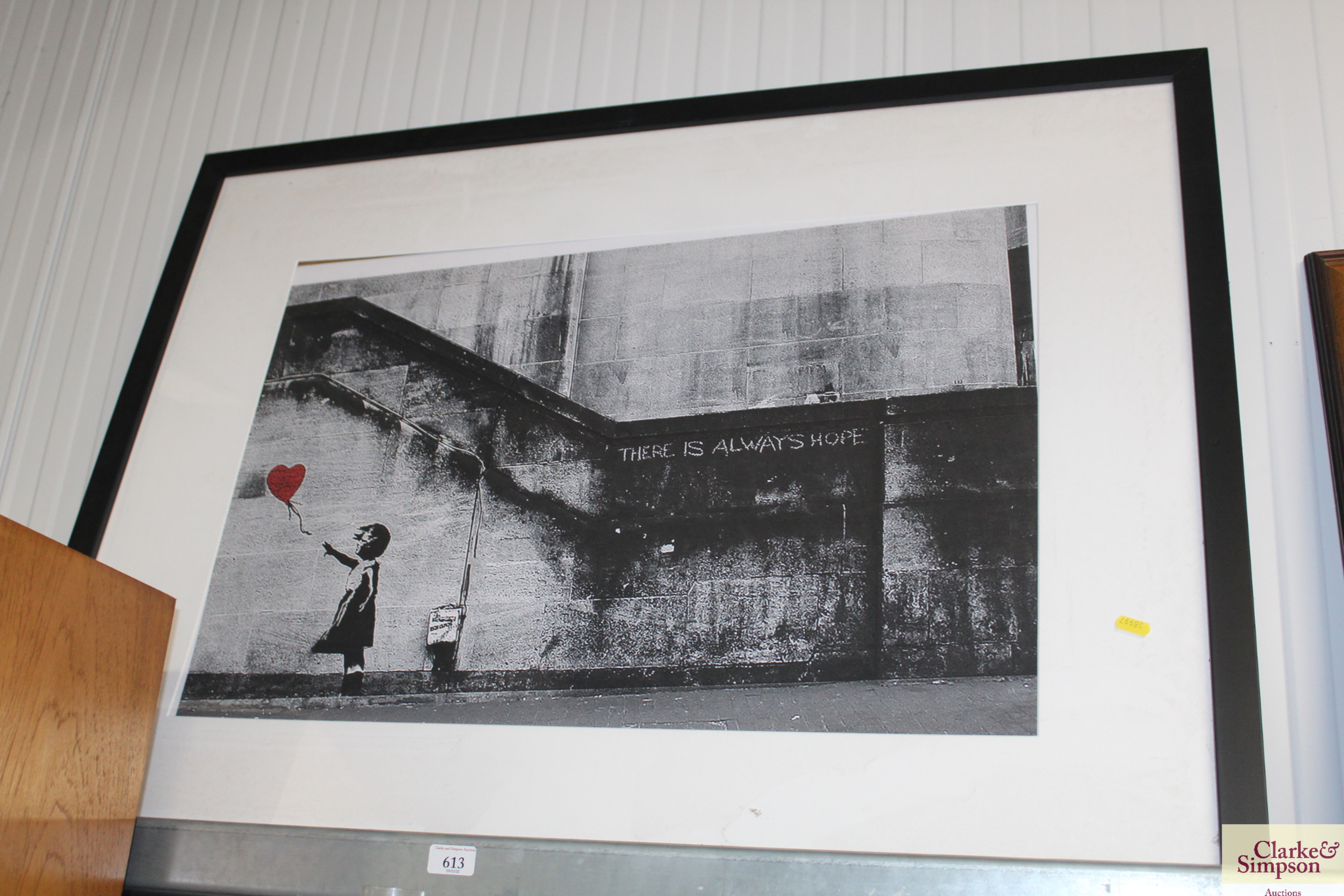 A photographic print, after Banksy