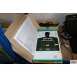 An Extech Instruments sound level alert and a box