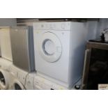 An Indesit tumble dryer