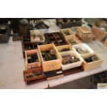 A large collection of various clock cogs, pulleys,