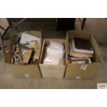 Three boxes containing ordnance survey maps; plast