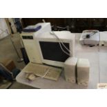 A Philips computer, Mitsubishi monitor, pair of Ca