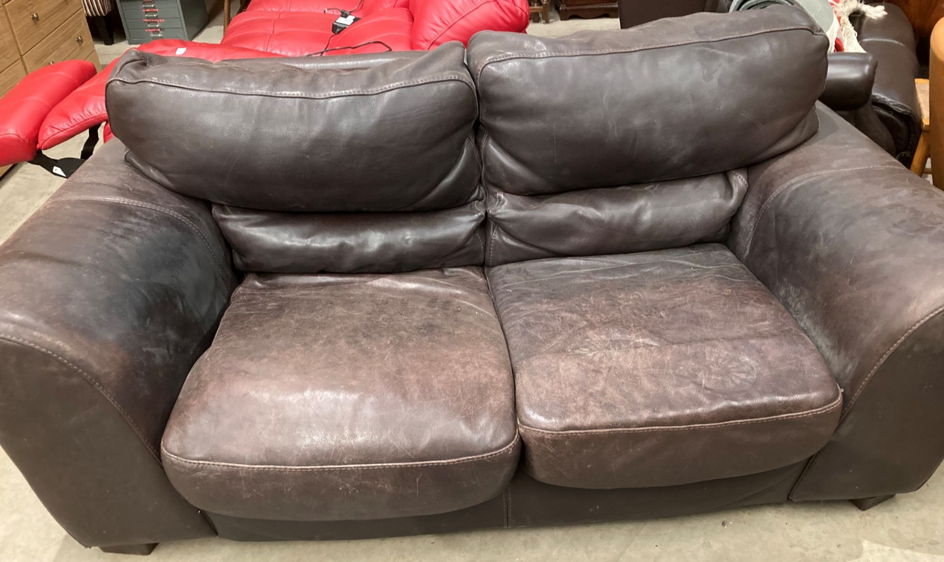 A Brown Leather 2 Seater Sofa