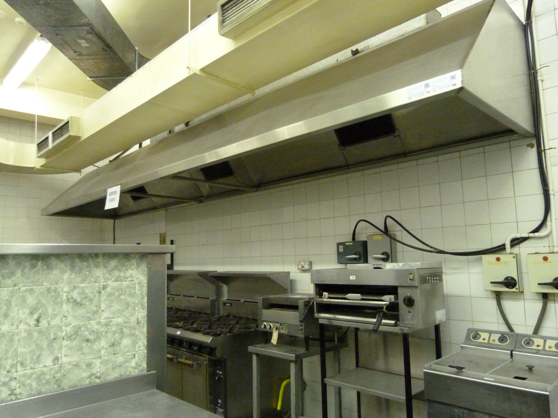 A kitchen extractor hood 580cm x 108cm x 69cm approximately