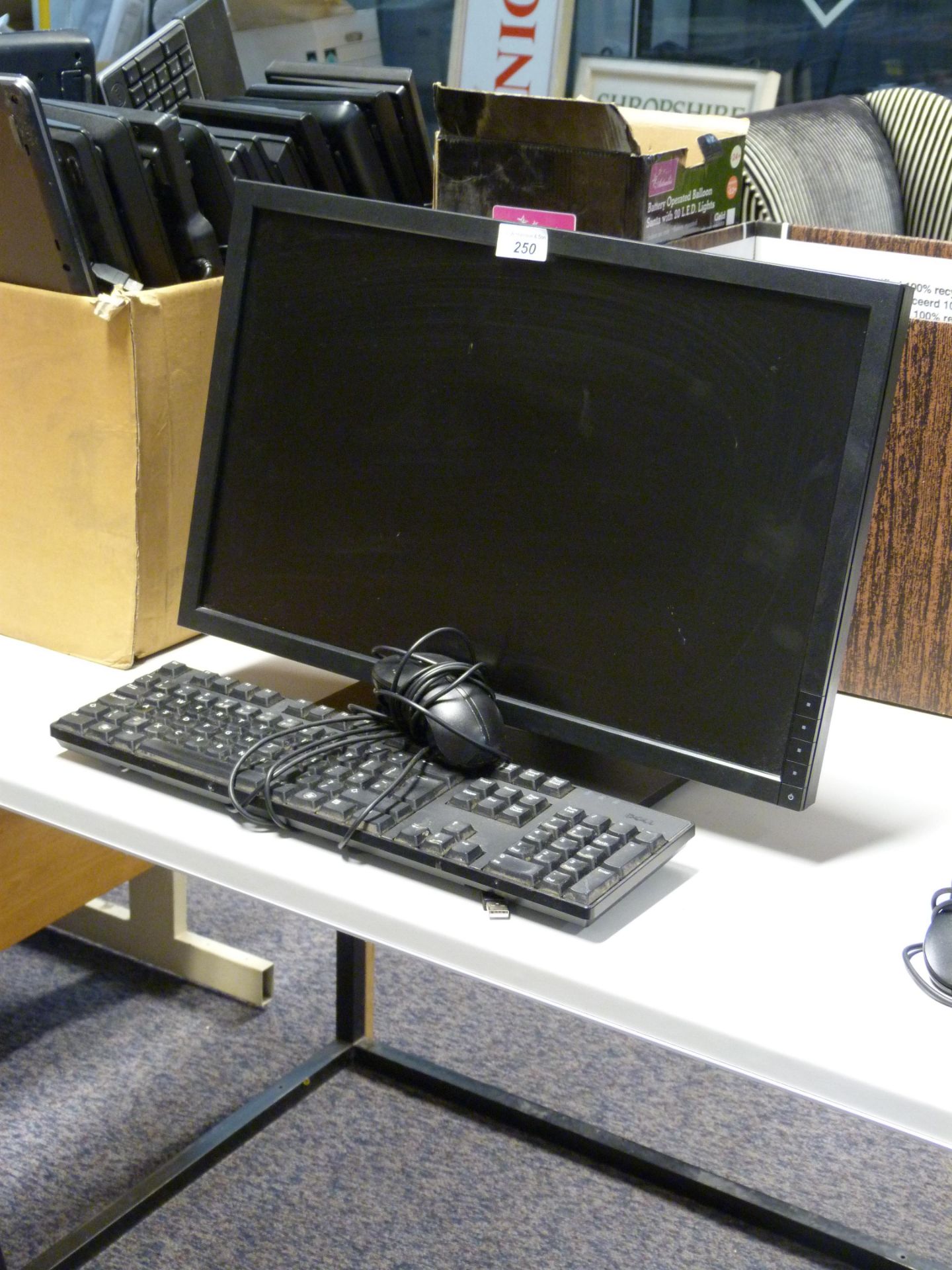 Dell monitor together with keyboard and mouse