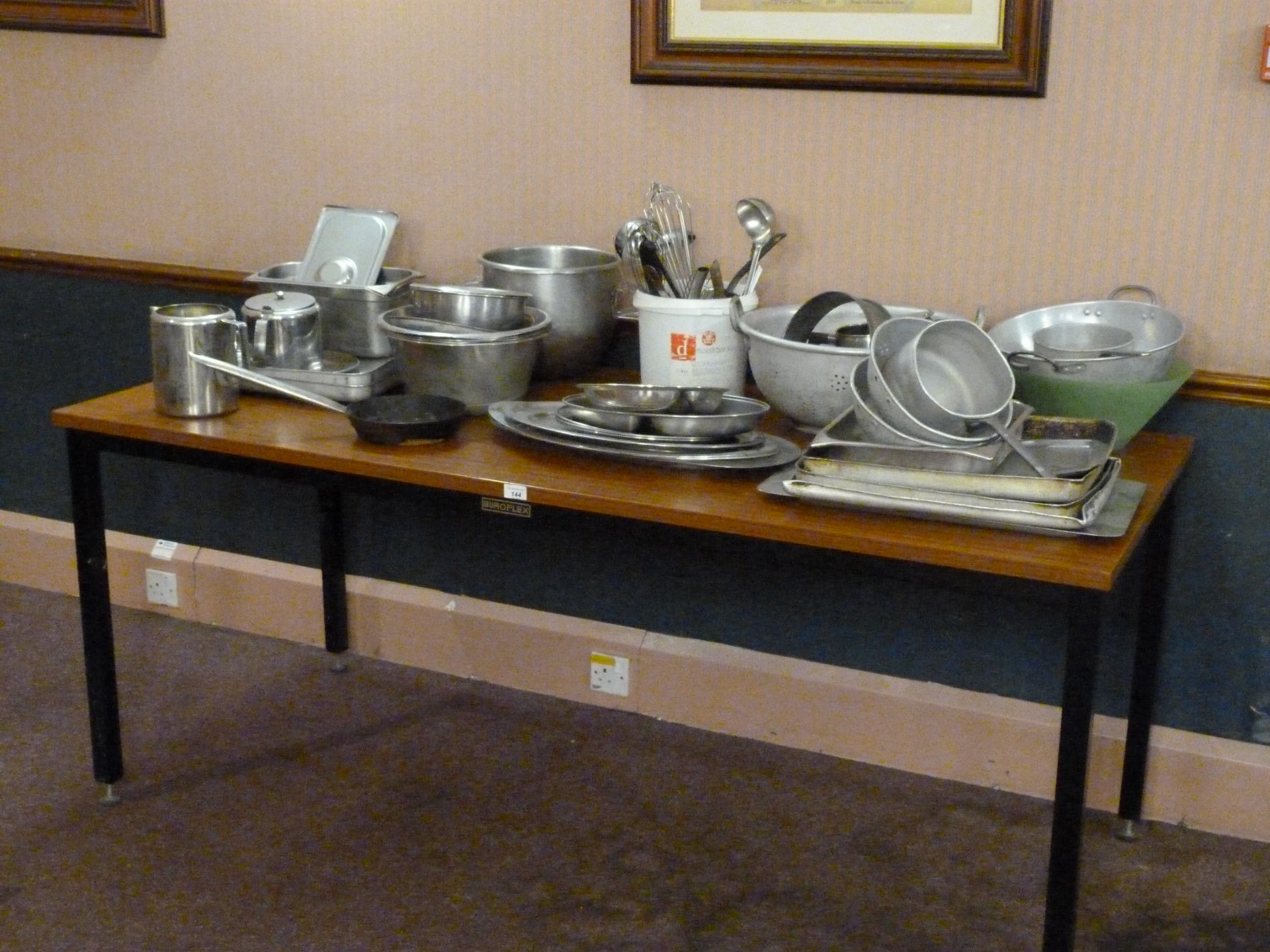 A quantity of kitchen utensils, trays,
