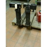 A pair of fork lift forks with Timotex LTD GSF1150 attached scales