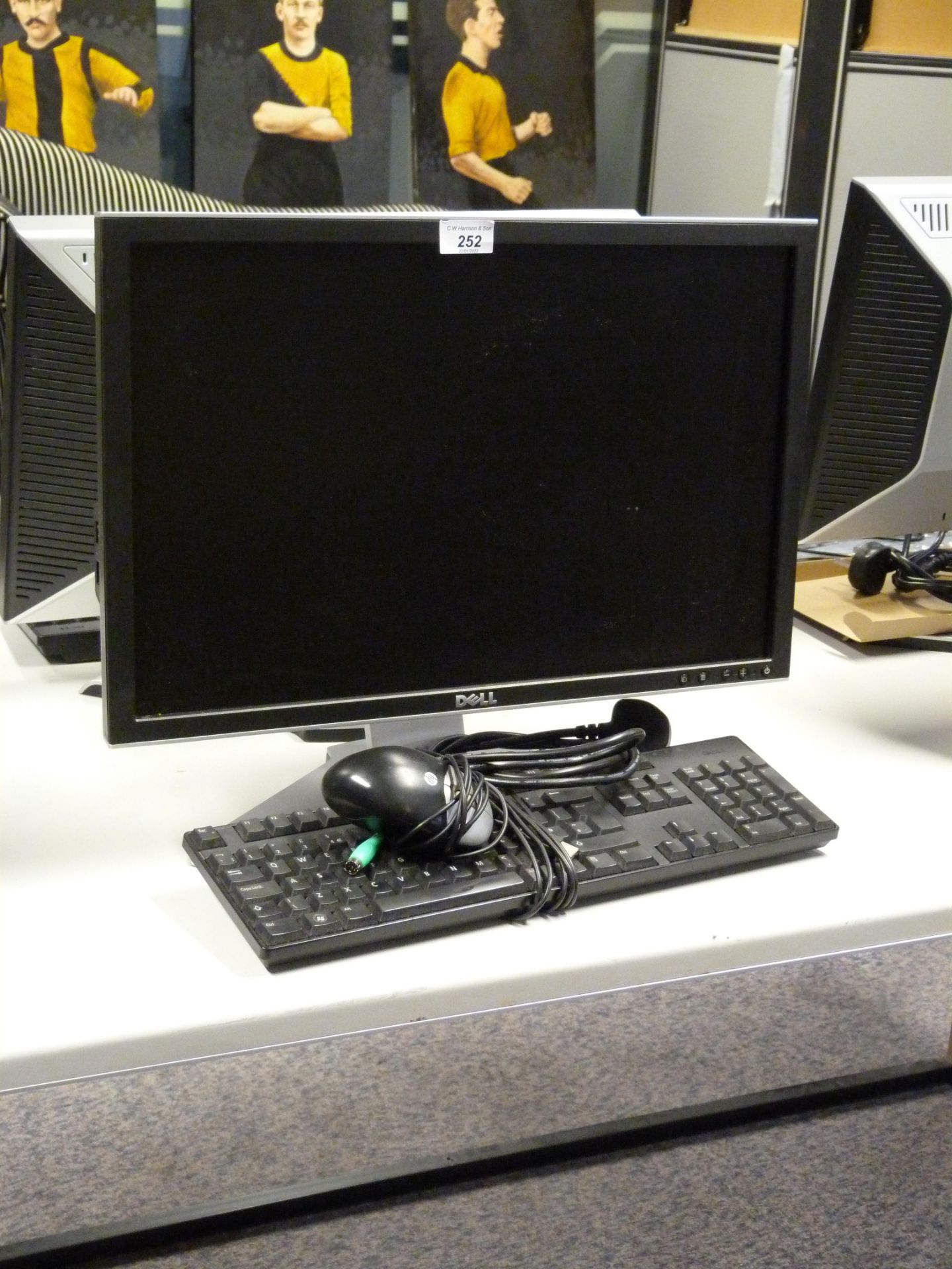 Dell monitor together with keyboard and mouse