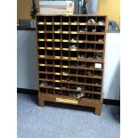 An eighty compartment storage cabinet,