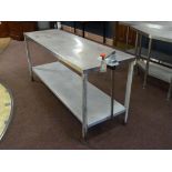 A steel framed stainless steel topped preparation table with shelf 183cm x 62cm with tin opener