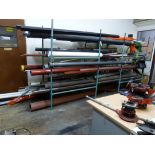 Rack and contents to include alkathene pipe, steel and plastic pipe, etc.