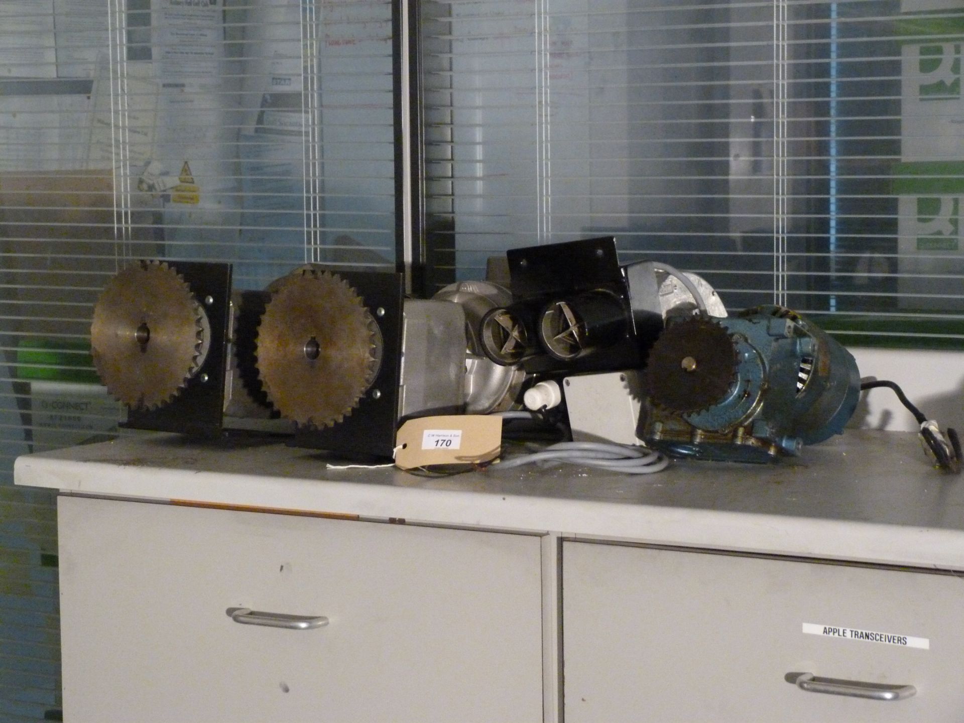 Three electric motors with gear boxes and a heater