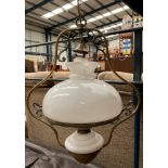 A brass ceiling light fitting with white glass shade 50cm