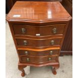 A small yew finish four drawer bow front chest of drawers 40cm x 72cm high on cabriole legs and
