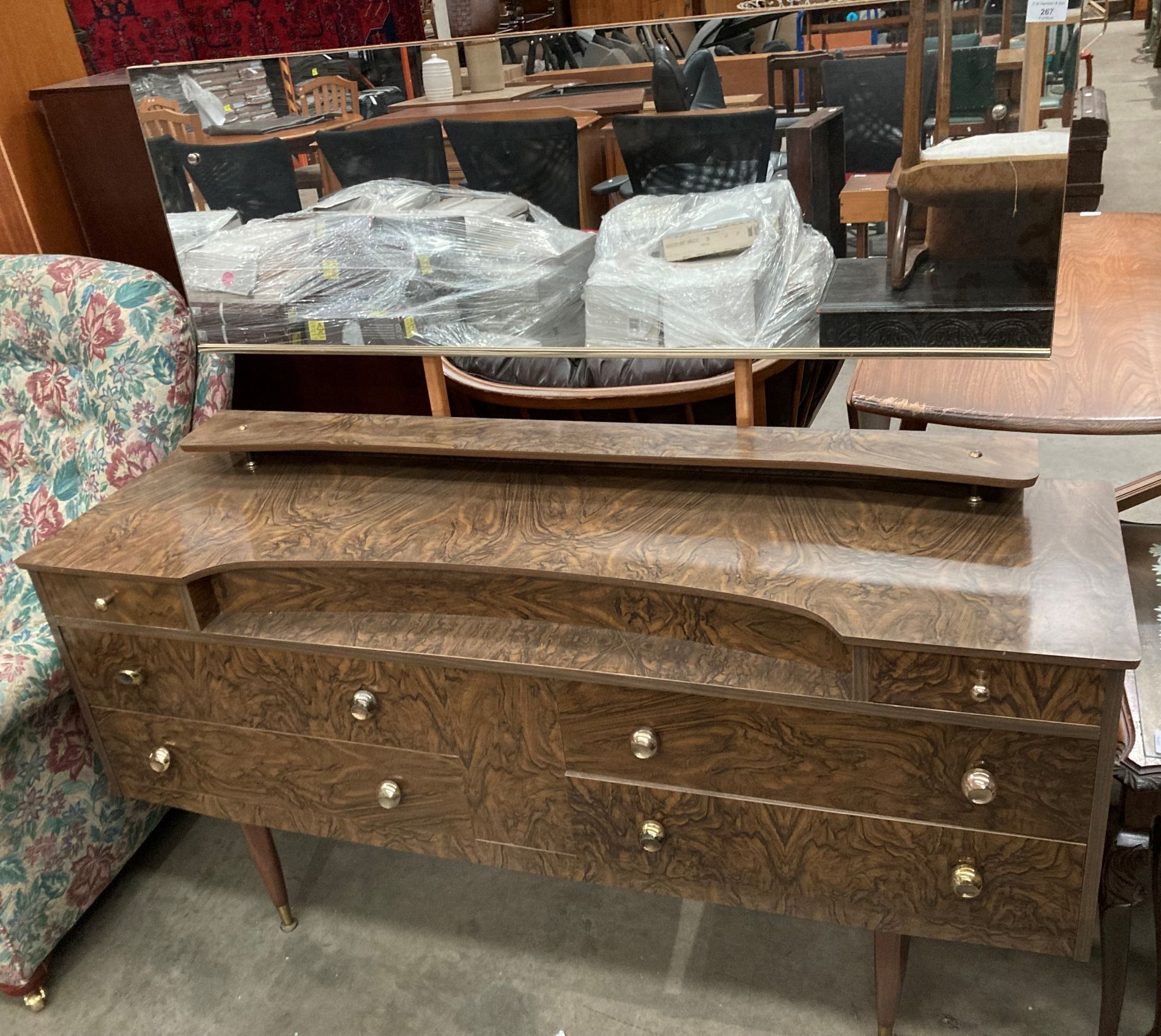 A walnut melamine finish 1960s six drawer mirror back dressing table,