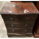 A small reproduction mahogany three drawer bow front chest of drawers 50cm x 60cm high - top marked