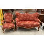 A restored mahogany double spoon back settee with brown patterned upholstery with a matching