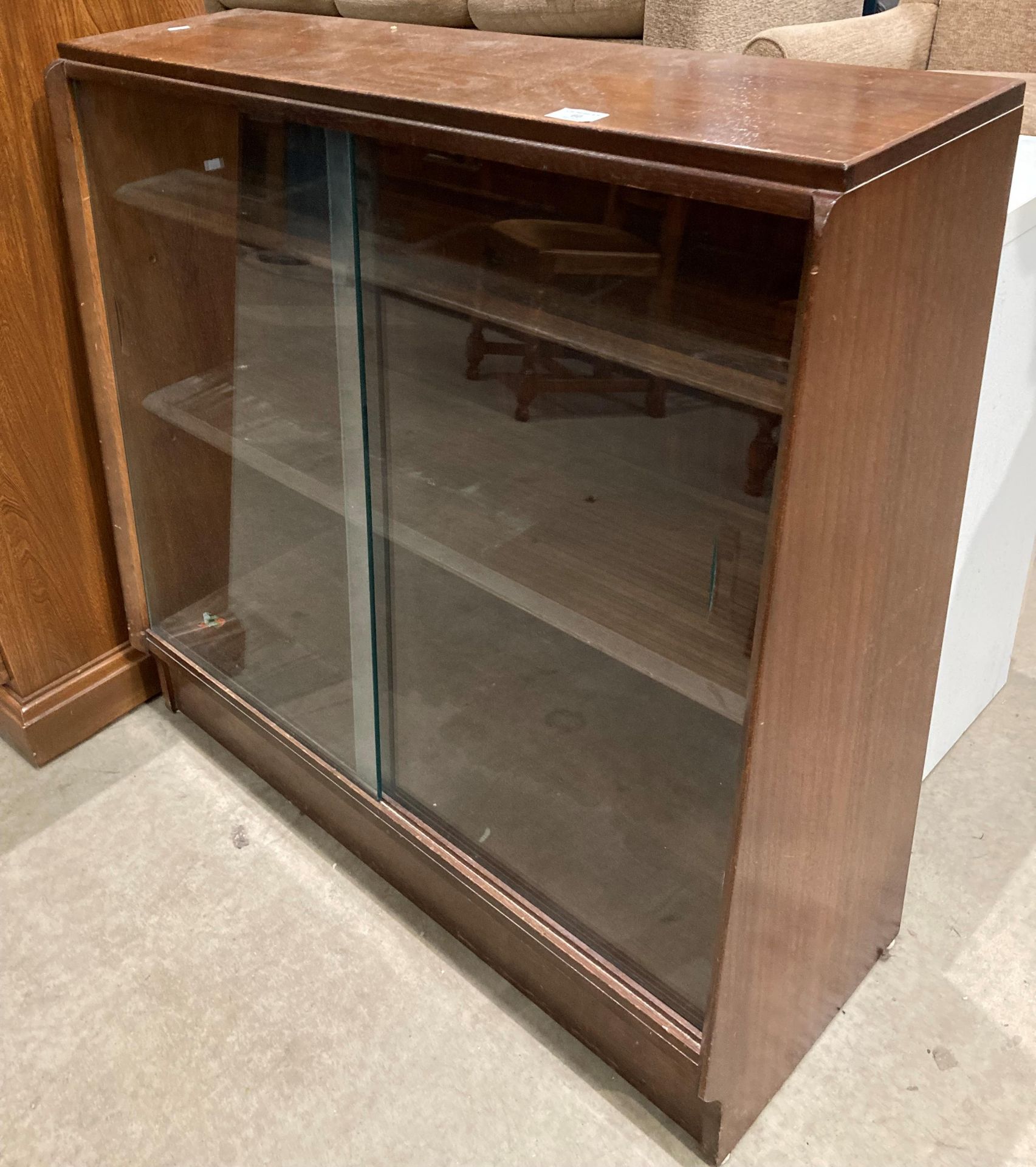 An oak three shelf bookcase with glass sliding doors, - Image 2 of 2
