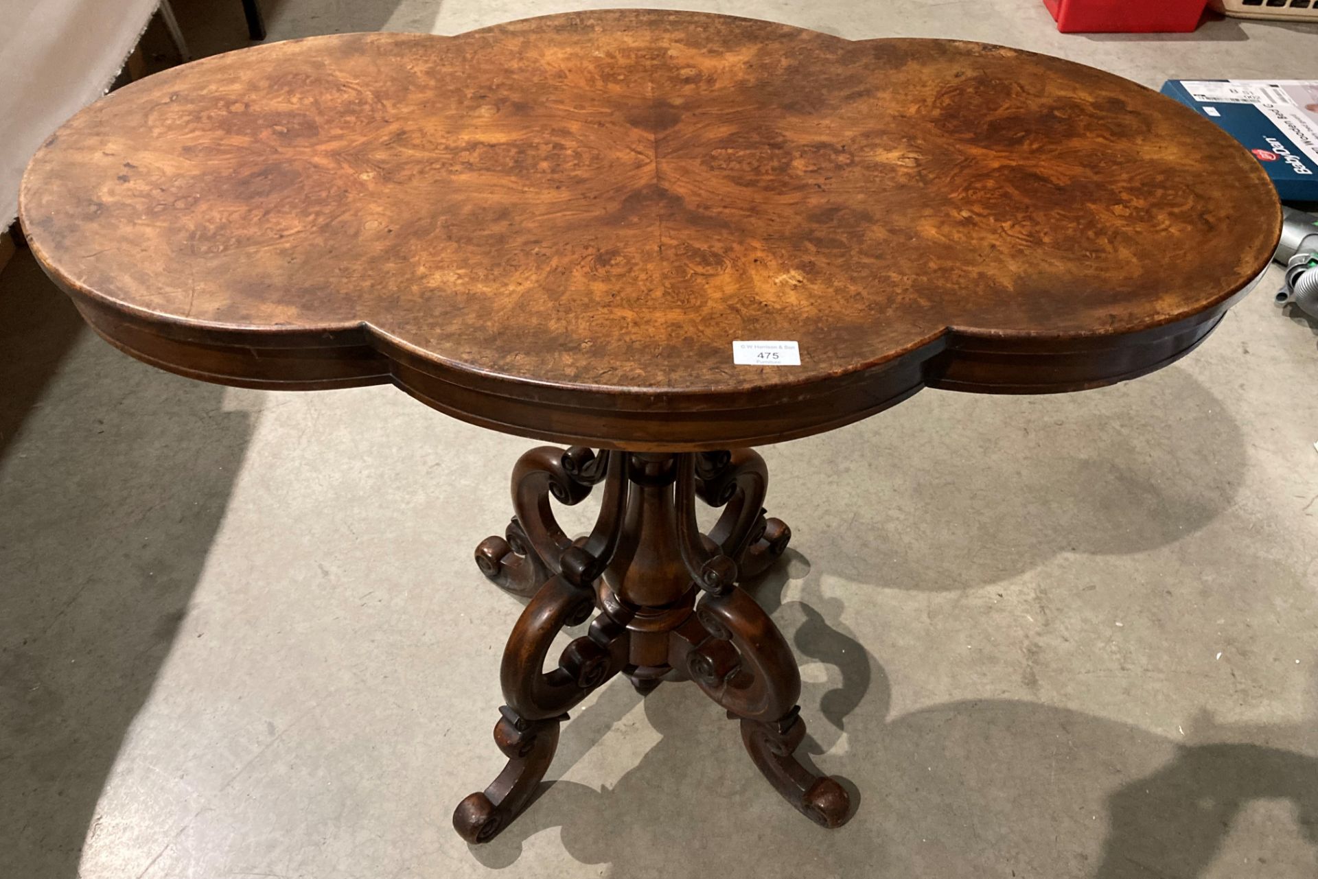 A burr walnut pedestal table with shaped top 90 x 52cm