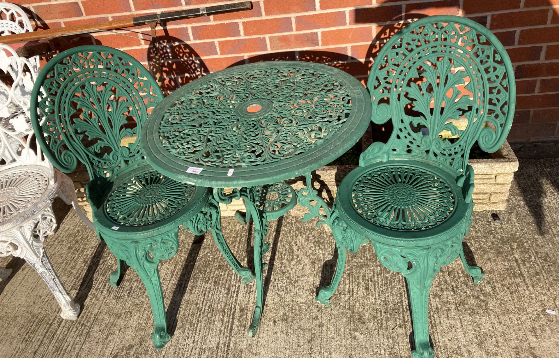 A green painted aluminium circular patio table 70cm diameter and two matching chairs - Image 2 of 2