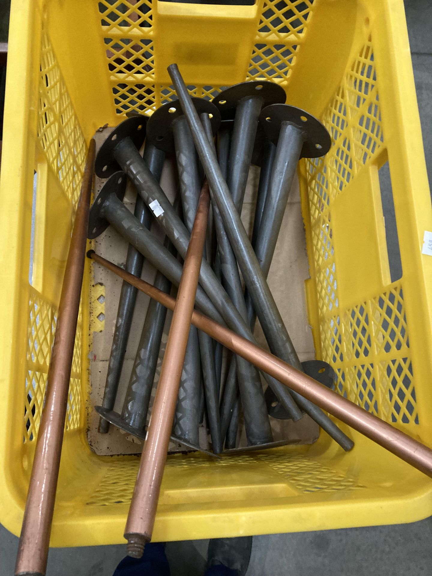 Contents to yellow plastic crate - assorted metal chair legs