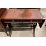 A reproduction mahogany finish two drawer,