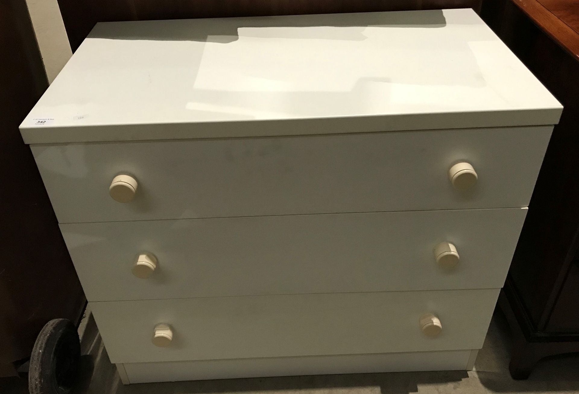 A white laminate three drawer chest of drawers 80cm