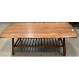 An Ercol medium elm rectangular coffee table with under tray 104cm x 48cm