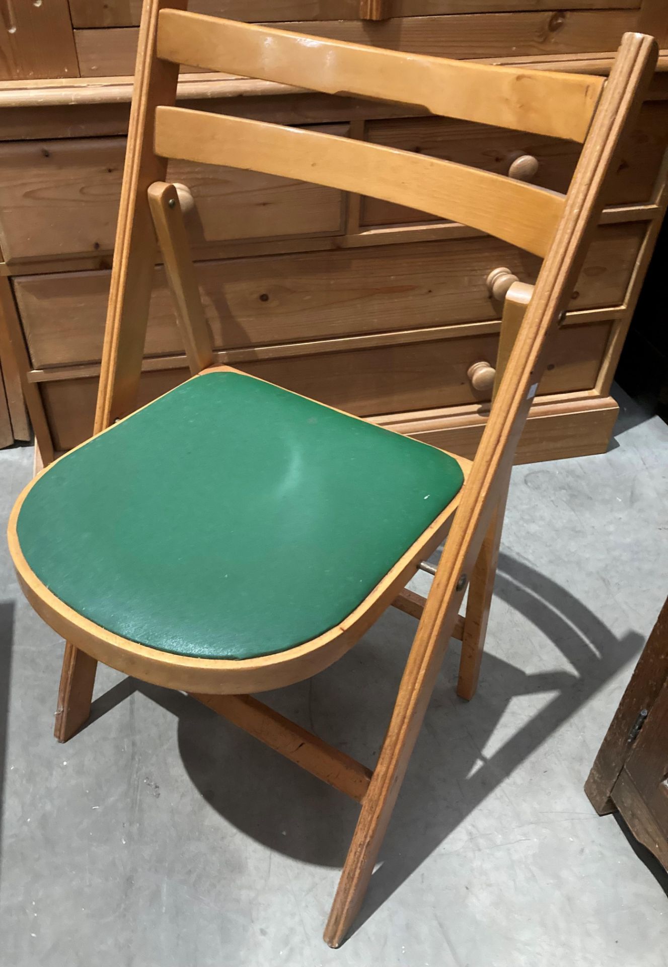 Four Apersite light oak folding meeting room chairs