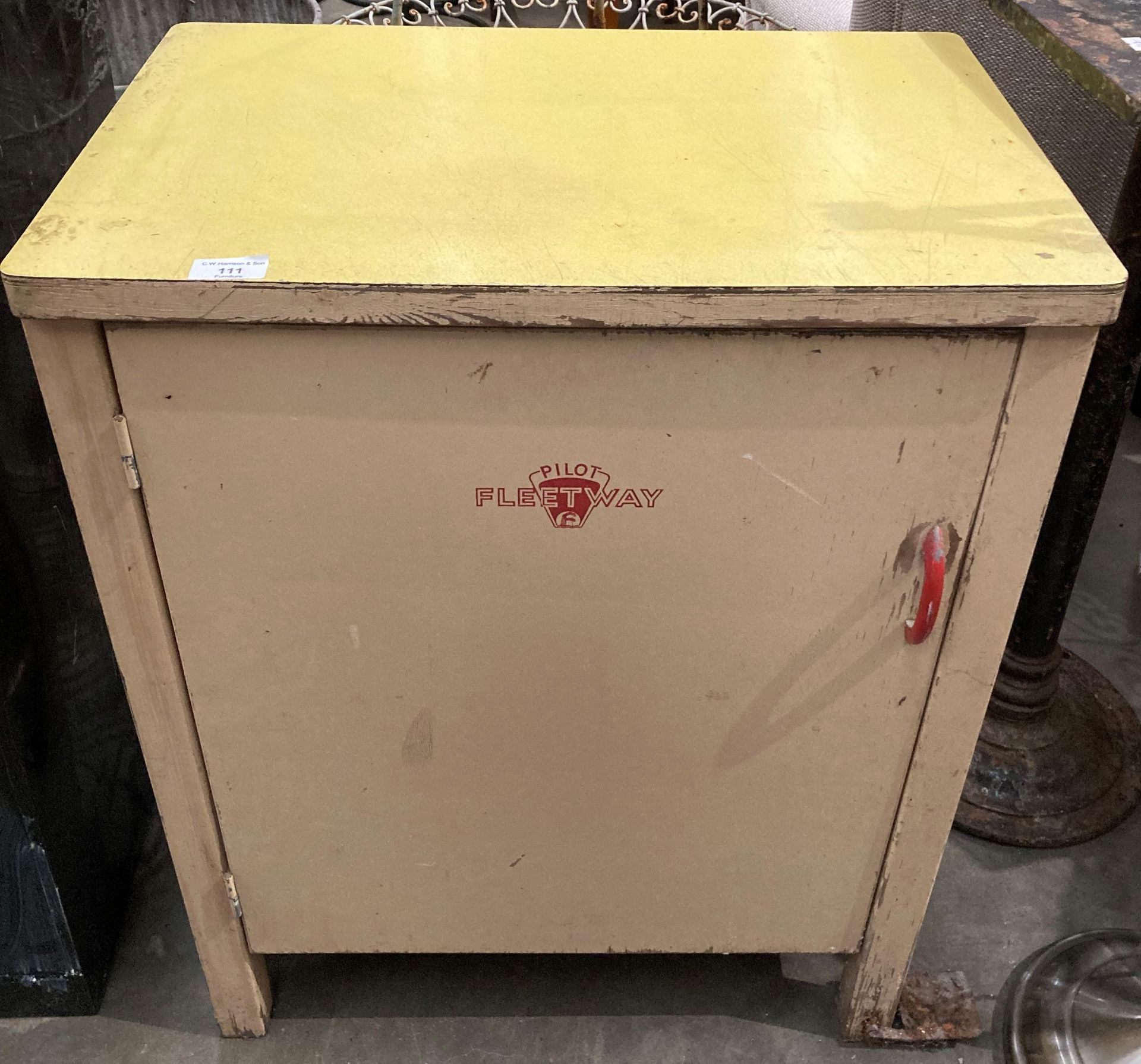 A cream painted single door cupboard with yellow formica top 60cm x 88cm x 75cm high logo'd Pilot