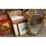 A gilt framed oval wall mirror,