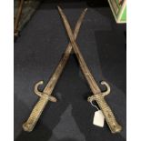 A bayonet possibly French with brass handle length of blade 56cm - slightly bent at end and a