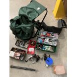 Two fishing tackle boxes and contents - assorted floats, hooks, reels, weights and a Swift 660 -6.
