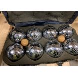 A cased set of metal French boules